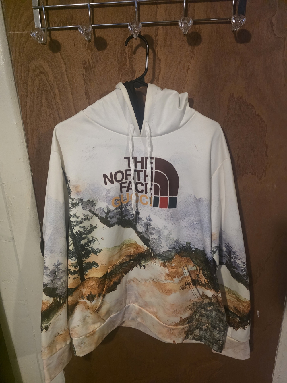 The North Face white multi-color landscape print hoodie